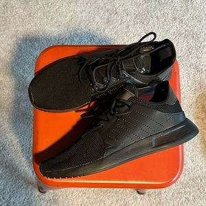 Adidas running shoe Black 9.5 runs large.